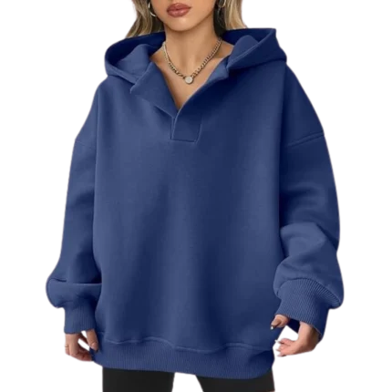 a woman wearing a blue hoodie